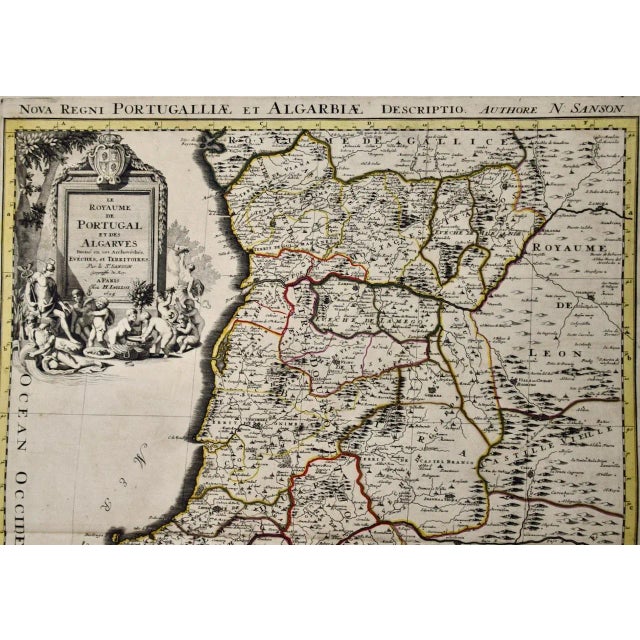 This large hand-colored map entitled "Le Royaume de Portugal et des Algarves Divisee en see Archeveches, Eveches et...