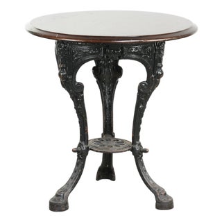 Antique English Side table with Cast Iron Base and Round Wooden Tabletop For Sale