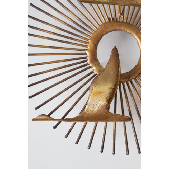 Vintage sunburst sculpture generally attributed to Curtis Jeré from the 60s/70s. Gilded iron with 3 brass and copper birds...