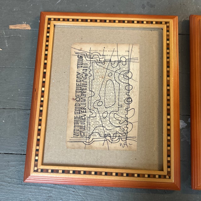 Set of two original Wayne Cunningham abstract marker drawings on vintage book pages. Framed and signed. Pages measure...