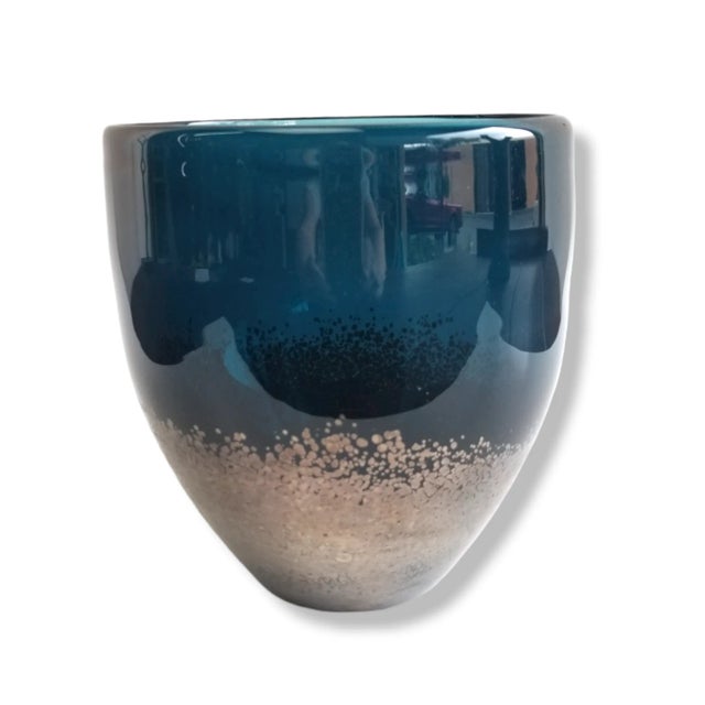 This is a wonderful vase and rare design from, Lazy Susan Company. This vase is handmade of blown glass. The glass for...