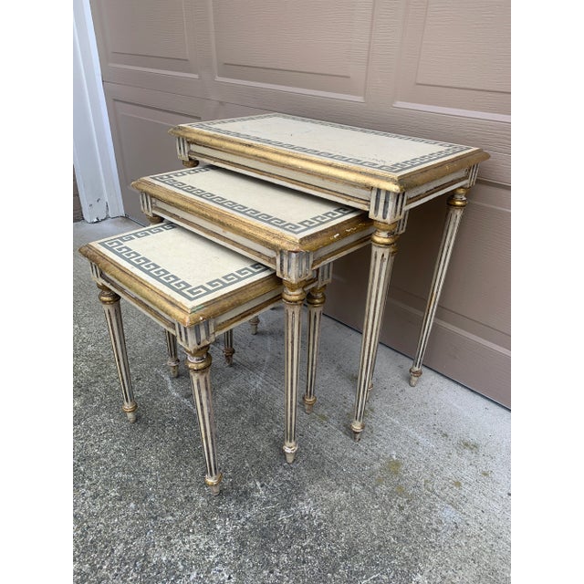 A wonderfully versatile set of three Italian nesting tables that effortlessly bridges Palm Beach glamour, English country...