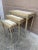 A wonderfully versatile set of three Italian nesting tables that effortlessly bridges Palm Beach glamour, English country...