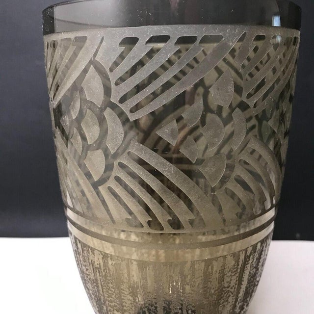 Art Deco vase, acid-etched, signed Daum Nancy with the Cross of Lorraine. Translucent glass vase with geometric floral...