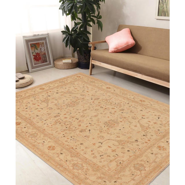 "Enhance the ambiance of your home with this magnificent Persian-influenced Turkish hand-knotted rug made by skilled...