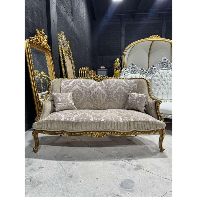 Fall in love with the timeless romance of this exquisite French Baroque sofa, a masterpiece where old-world elegance meets...