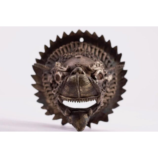 Burning wall-mural in Asian bronze, representing a dragon, Tibet or Bhutan head, beginning of the 20th century. The Druk...