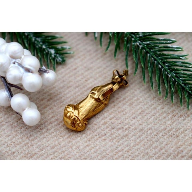 19.2K Gold Our Lady of the Immaculate Conception Pendant, in Worn conditions.