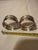 Elevate your tablescape with this handsome pair of vintage mid-century sterling silver napkin rings. Featuring a timeless,...