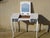 A 1970s dressing table in solid wood, restored and painted white. The central section opens to reveal a mirror on a...