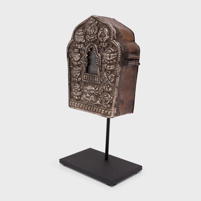 Tibetan traveling shrines, known as Gau, were believed to offer protective powers and were used to hold and carry sacred...