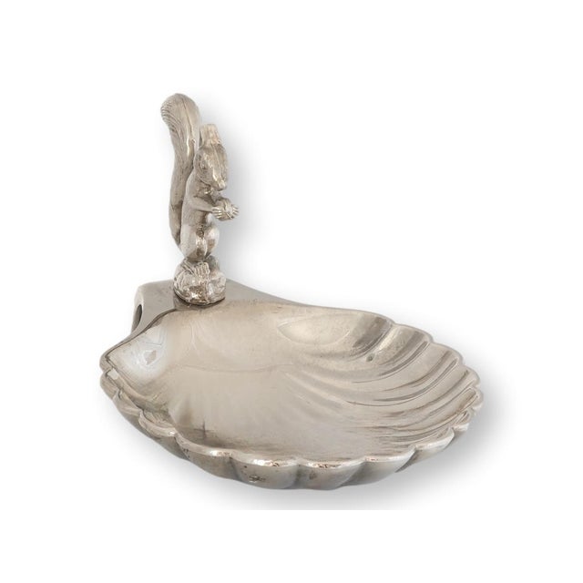 English silver plated squirrel trinket dish, dating to the mid 20th century. Shaped as a shell form dish with scalloped...