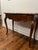 Ethan Allen Country French Single Drawer Console Table. This table features a serpentine-shaped apron, ornate bronze-toned...