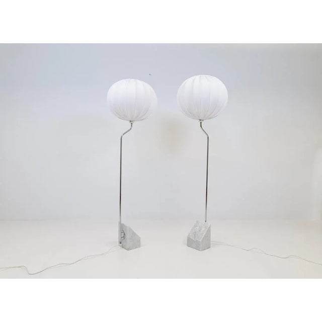 Large and heavy pair of marble stone floor lamps with chromed steel arms. Bergboms design with all new cotton shades, made...
