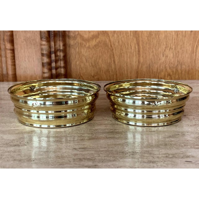 A pair of brass bowl in stepped concentric form designed by Dagobert Peche (Austrian, 1887-1923) and for Wiener Werkstatte...
