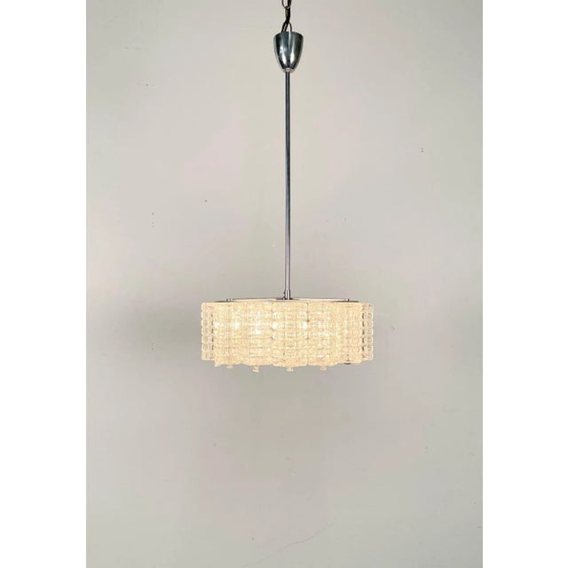 Art Deco, Crystal and Chrome Chandelier, Circa 1930s Cricluar in form having five lights. Center pole can be added to or...