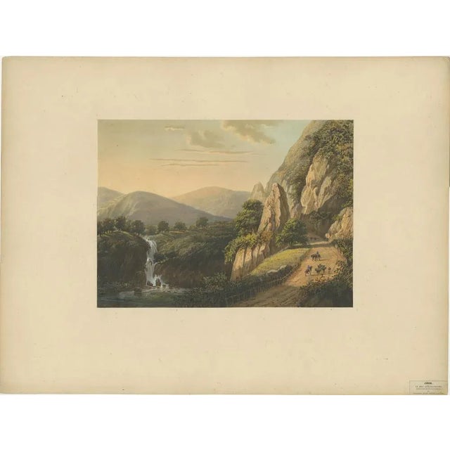 Mountain Road and Waterfall in the Tengger Range – Java Lithograph, Published 1872 This powerful and richly detailed...