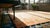 Outstanding Orange-Amber Open Field With Asymmetric Details in a Floral Pattern Antique Chinese Peking Rug For Sale - Image 10 of 11