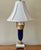 An elegant and upscale French Sèvres style table lamp of cobalt blue and white porcelain and gold touches with the look of...