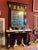 This exquisite Italian Empire period console table with mirror, dating from the late 18th to early 19th century...