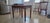 Once Upon A Time, this table was hot pink, and under that black, and then red and then white. Meticulously restored she...