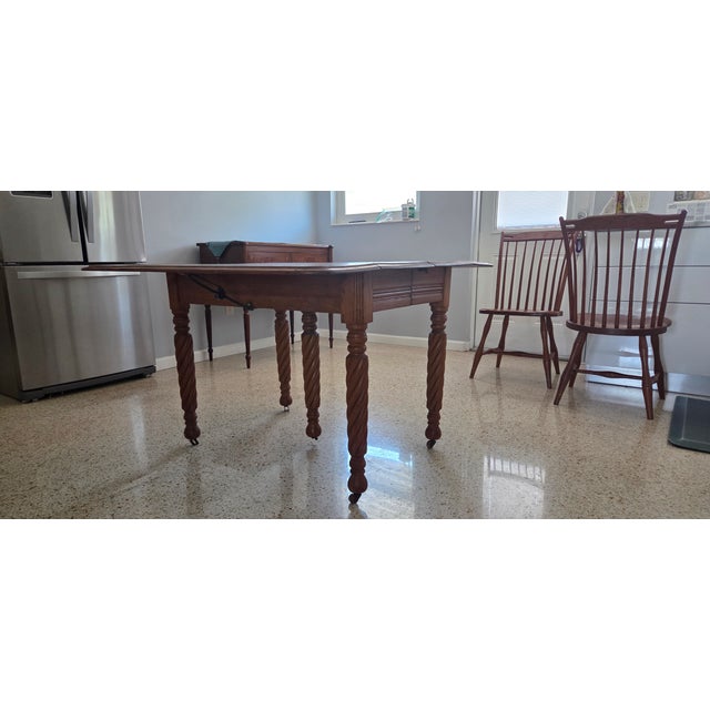 Once Upon A Time, this table was hot pink, and under that black, and then red and then white. Meticulously restored she...