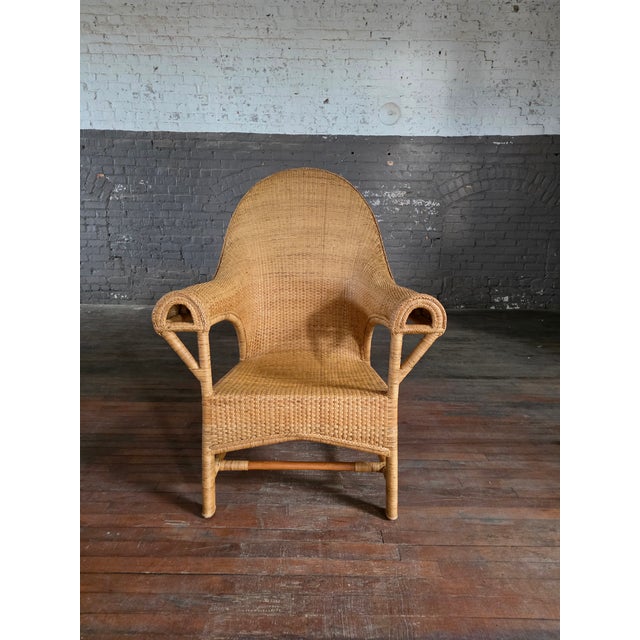 Vintage arts & crafts wicker rattan armchair constructed with bamboo frame. Condition is excellent if not impeccable....