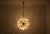 Chandelier known as "Dandelion" or "Flake," Austria, circa 1960. The "Dandelion" and its "Pyra" variants were installed in...