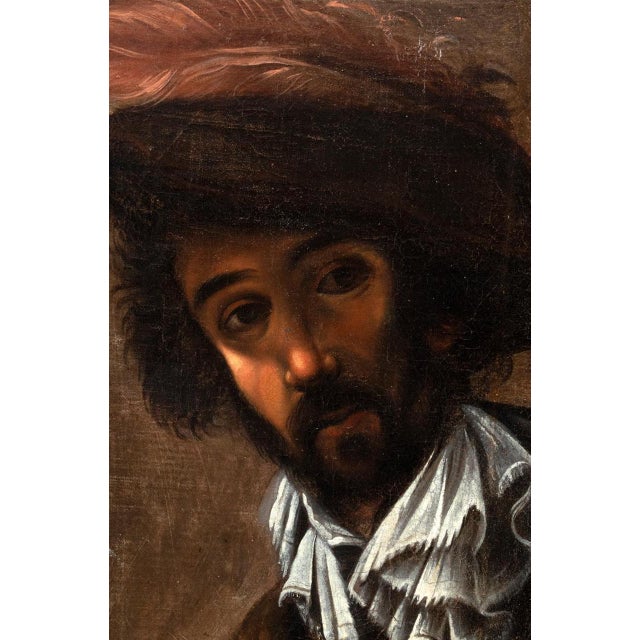 "Portrait of a Young Man" (also known as "The Brave" or "The Swordsman"), attributed to the circle of the French Baroque...