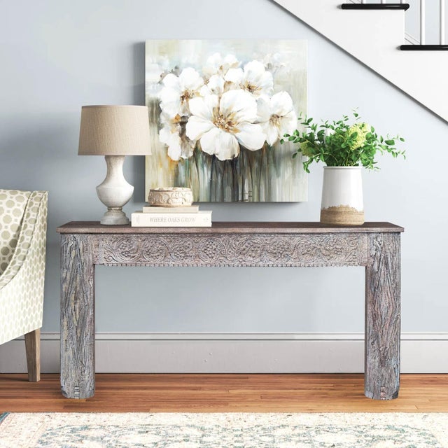 Dimensions: 62" W x 15" D x 31" H This piece utilizes old architectural elements, re-claimed woods and is handcrafted by...