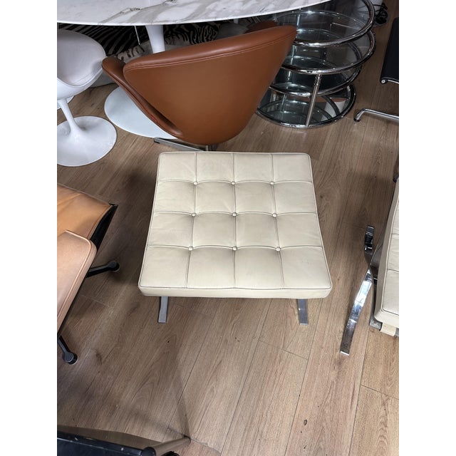 Beautiful pair of Barcelona-style footstools, designed by Mies van der Rohe and produced by Knoll International in the...