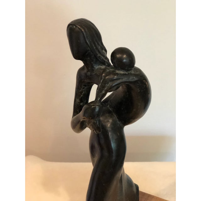 I loved how the simplicity of this sculpture expressed so much meaning. A mothers love for her child. This contemporary...