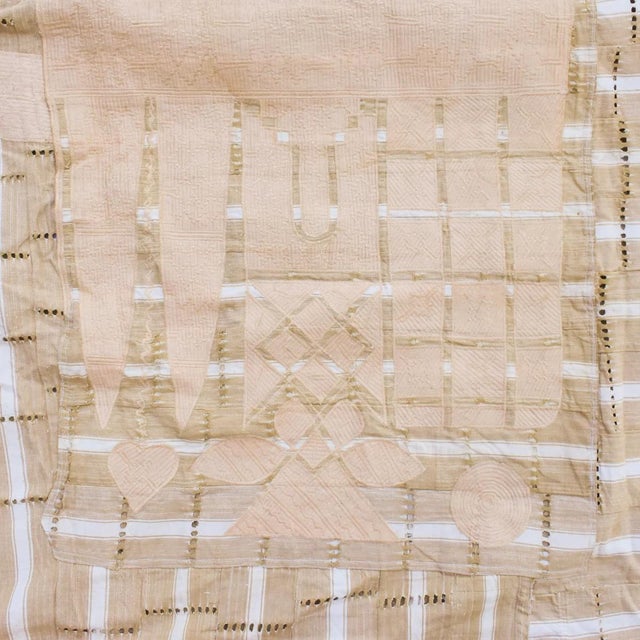 A superb shirt in amazing condition. This elaborate shirt was made by the Hausa of Nigeria using a cotton cloth made of...
