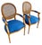 Elegant set of vintage French Provincial Louis XVI style armchairs featuring oval cane backs, sculptural wood frames, and...