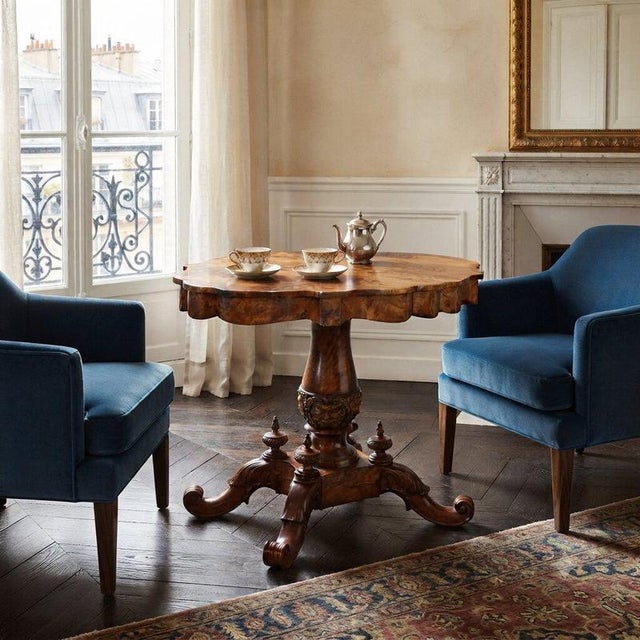 Luigi Filippo biscuit table crafted in walnut and walnut burl, typical of the second quarter of the 19th century in Italy....