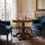 Luigi Filippo biscuit table crafted in walnut and walnut burl, typical of the second quarter of the 19th century in Italy....