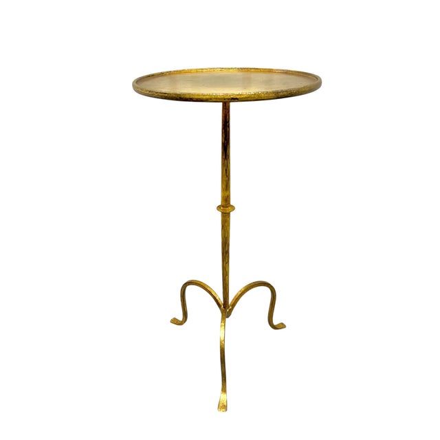 Elegant in its simplicity, this hand-forged gilded iron martini table brings refined European character to any interior....