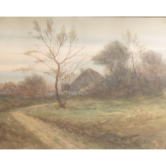 A watercolor painting of a country landscape by the American artist Edward R. Sitzman (1874-1949). This painting depicts...