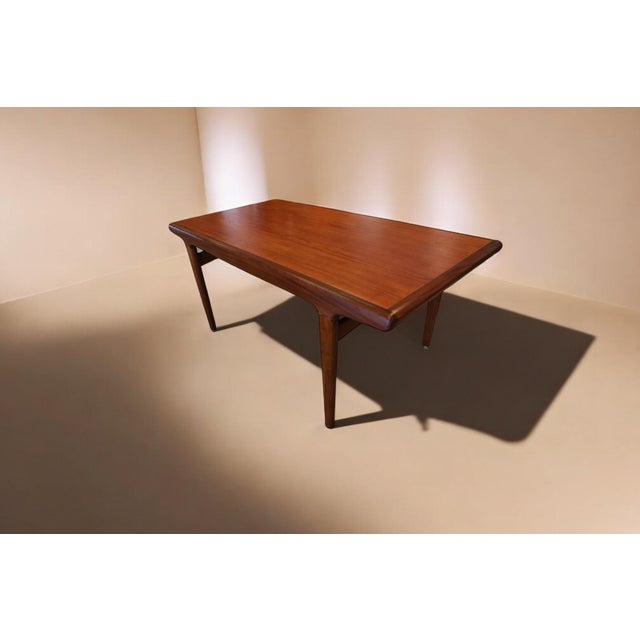 A highly unusual dining table designed by Johannes Andersen for Uldum møbelfabrik in Denmark. Johannes is considered one...