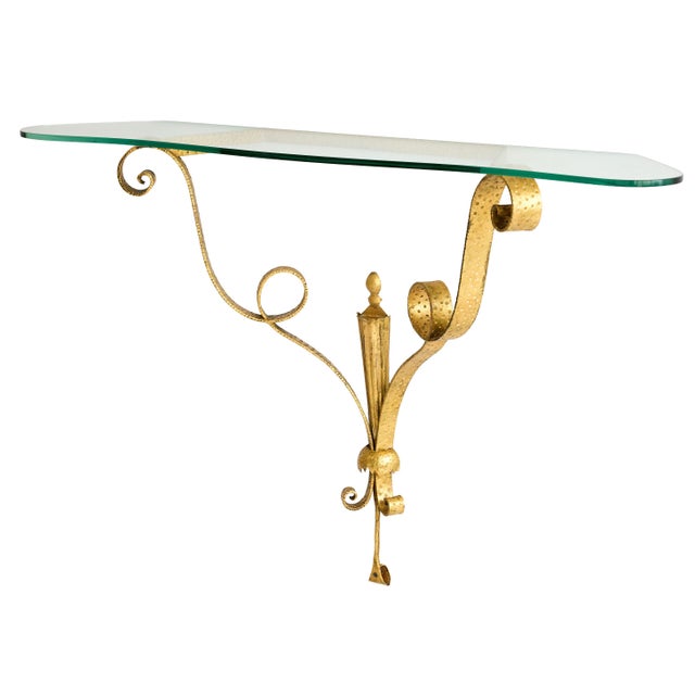 An exceptional example of Italian decorative ironwork, this wall-mounted console table exemplifies the confident...