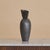 A French ceramic vase by artist André Bloch. Crafted in stoneware and rising in a tapered, elongated silhouette, the...