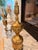Elegant pair of mid-century Japanese brass and wrought iron andirons in the Georgian Revival taste, featuring urn-form...