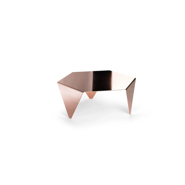 <p>The <em>Ruche</em> coffee table is made in galvanized metal with a copper finish.</p>