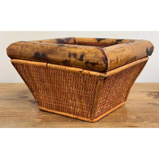 Vintage scorched bamboo planter box with exaggerated upper rim and four caned sides. May have been a lidded box at one...