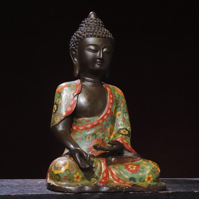This is a striking vintage Chinese bronze figure of Amitabha Buddha, adorned with vibrant cloisonné enamel robes. The...