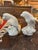 Antique pair is early 19th century Chinese Blanc de Chine porcelain hawks or falcons perched atop rocks both with sea...
