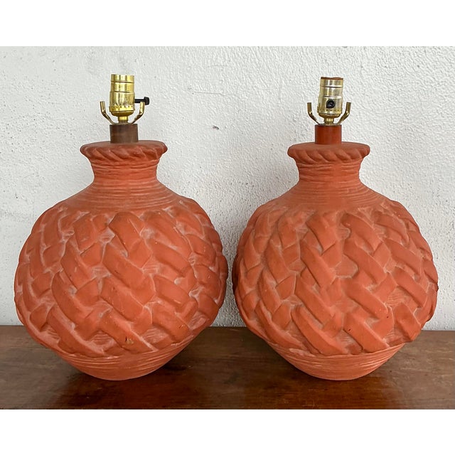 This striking pair of vintage table lamps exudes organic warmth and tactile appeal, featuring a beautifully executed faux-...