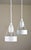A rare and highly desirable matching pair of early-production pakhus pendant lamps, manufactured by louis poulsen,...