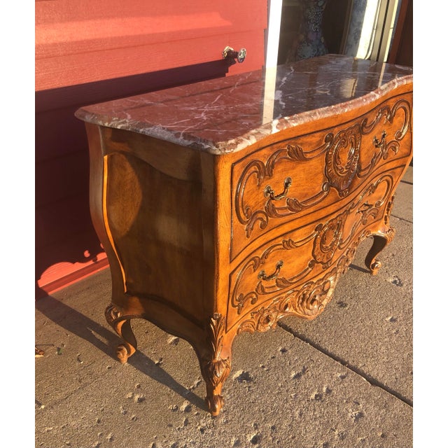 Superbly elegant 2 drawer John Widdicomb style Bombe dresser with marble top. Excellent quality a must have in curated...