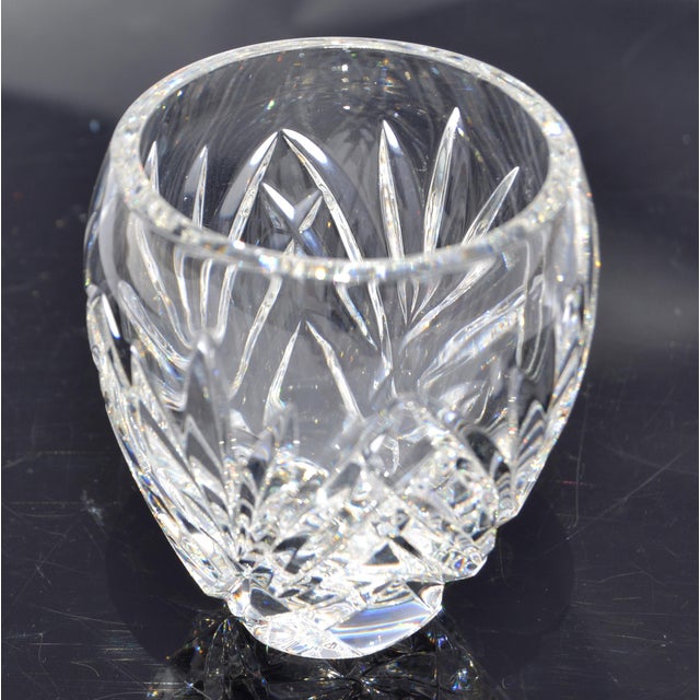 1960s Waterford Crystal votive candle holder with intricate cut-glass detailing and a polished finish. The Irish luxury...